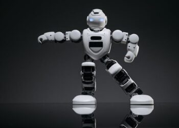 LocoFormer Generalist Locomotion via Long-Context Adaptation